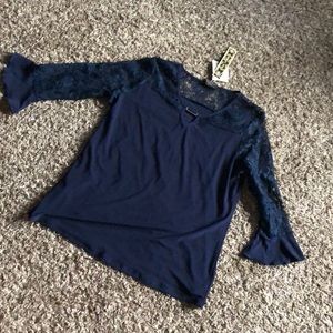 New with tags Navy blue 3/4 sleeve shirt.